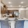 Model kitchen at our apartments in Magnolia with granite counter tops and stainless steel appliances.