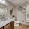 a bathroom with a marble countertop